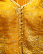 Regal Golden Embroidered Shimmer Backless Sharara Suit with Net Dupatta