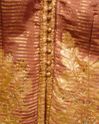 Regal Golden Embroidered Shimmer Backless Sharara Suit with Net Dupatta
